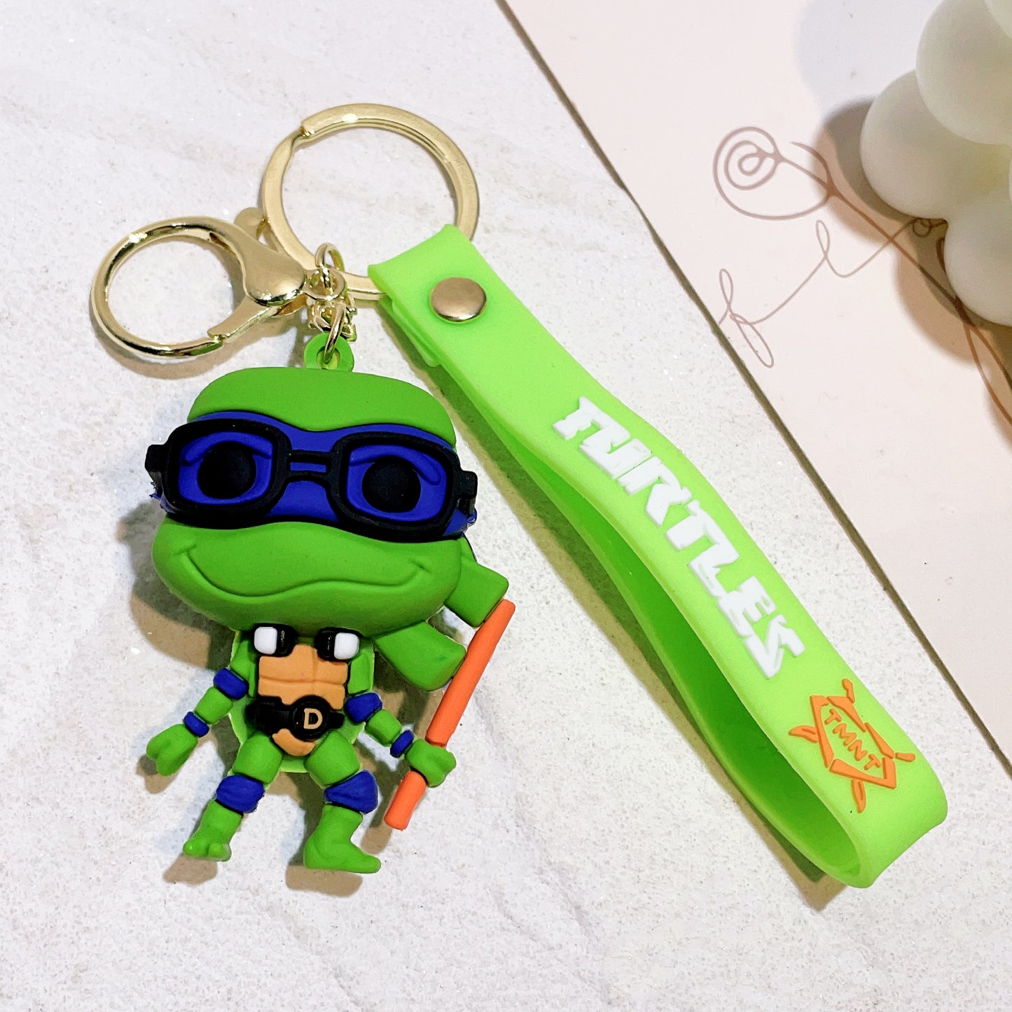TMNT 3D Keychain Collection – Premium Ninja Turtles Chibi Keyrings with Wrist Strap