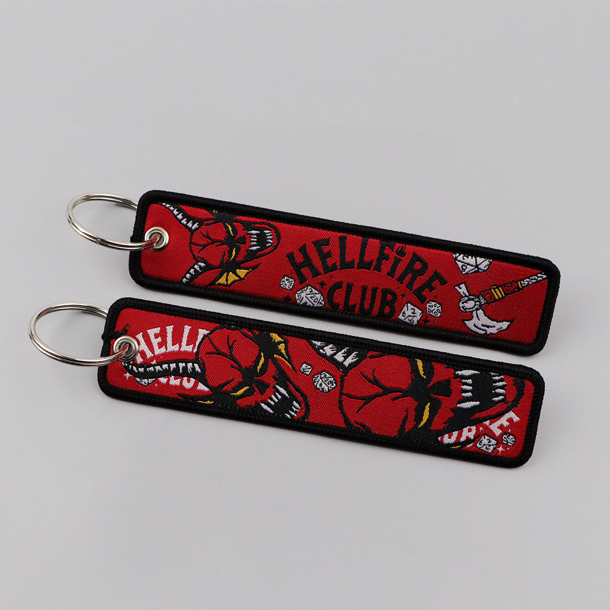 STRANGER THINGS "HAWKINS" EMBROIDERED FLIGHT TAG KEYCHAINS