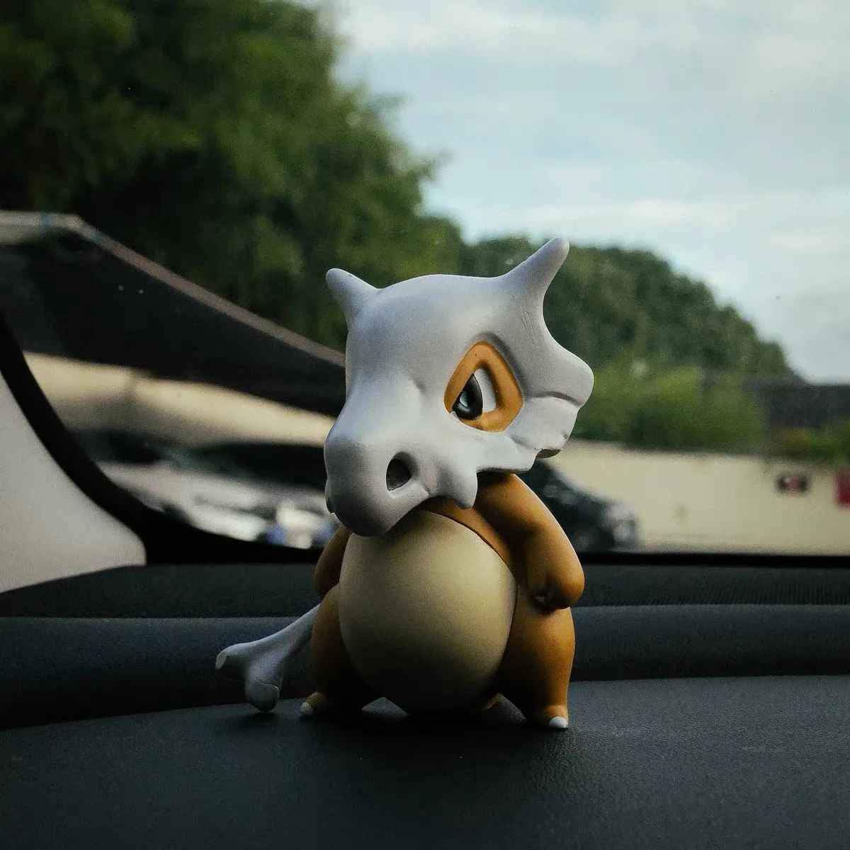 Cubone Hand-Held Figure | Pokémon Chibi Statue with Bone Club | Desktop Anime Collectible | Geekzillaa